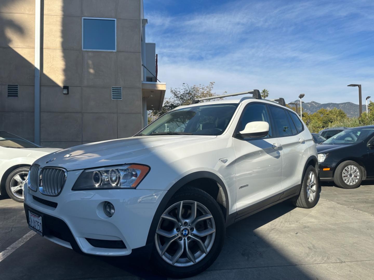 2013 WHITE BMW X3 xDrive28i (5UXWX9C52D0) with an 3.0L L6 DOHC 24V engine, 8-Speed Automatic transmission, located at 30 S. Berkeley Avenue, Pasadena, CA, 91107, (626) 248-7567, 34.145447, -118.109398 - Crown City Motors is a used “Buy Here Pay Here” car dealer in Pasadena CA. “Buy Here Pay Here” financing, means that when you purchase your vehicle from our dealership, that you make the payments to the dealership as well. We do not need the banks approval to get you approved for a used auto - Photo#0